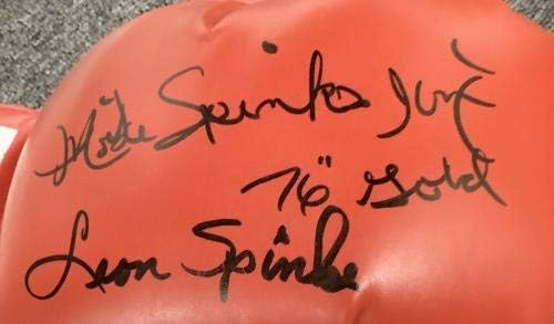 Leon Spinks Luva de boxe assinada Everlast Auto + Michael Spinks 76 Gold Inscr JSA - luvas de boxe autografadas
