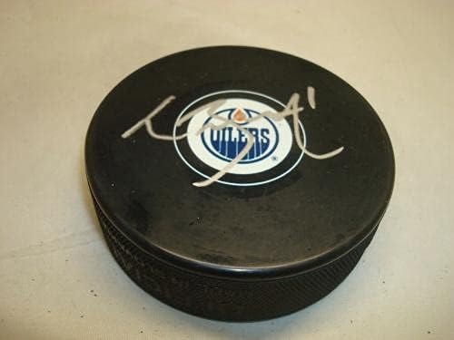 Laurent Brossoit assinou Edmonton Oilers Hockey Puck autografado 1b - Pucks autografados da NHL