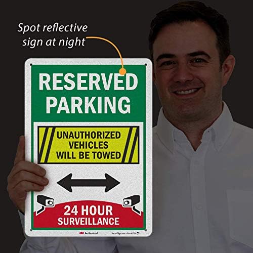 SmartSign “Estacionamento reservado - vigilância 24 horas, veículos não autorizados serão rebocados”. Alumínio refletivo de grau de