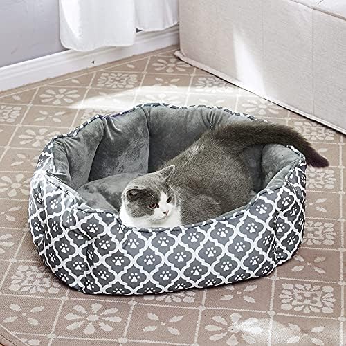 Luckitty Cama de gato grande de 25 polegadas, veludo macio e almofada de dois lados de Oxford à prova d'água, fácil lavável, leitos geométricos ovais para gatos grandes ou cães pequenos, padrão de pegadas cinzas