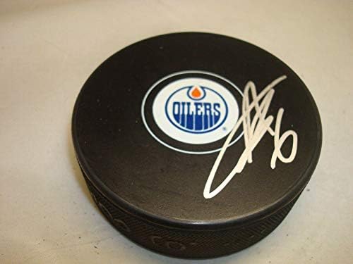 Adam Larsson assinou o Edmonton Oilers Hockey Puck autografado 1b - Pucks autografados da NHL