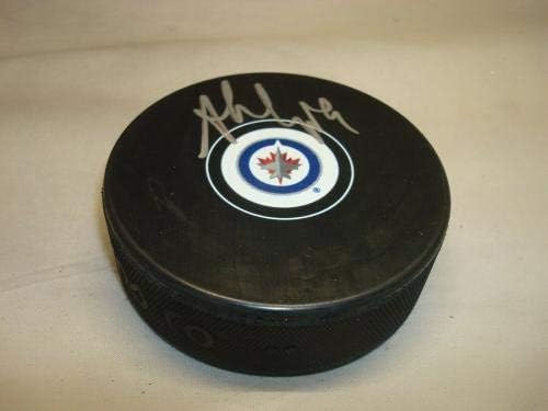 Andrew Copp assinou o Winnipeg Jets Hockey Puck autografado 1a - Pucks autografados da NHL