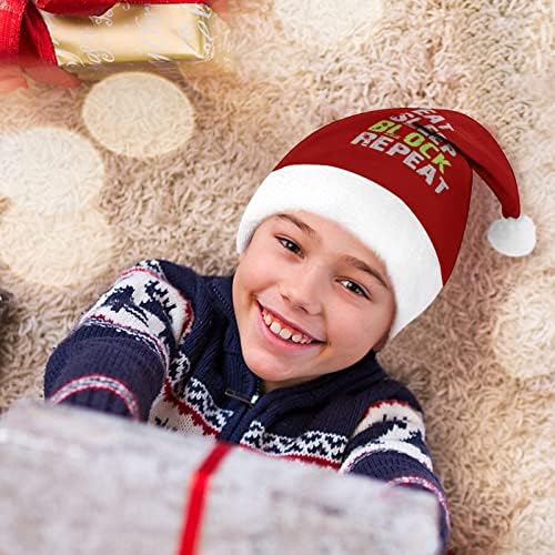 Coma bloco de sono repetindo o chapéu de natal de Natal e bons chapéus de Papai Noel com borda de pelúcia e decoração
