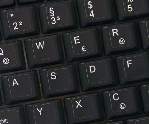 Netbook para adesivos de teclado alemão no fundo preto